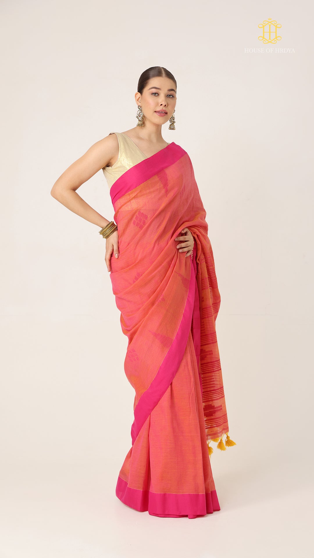 Nirva Jamdani Peach Saree